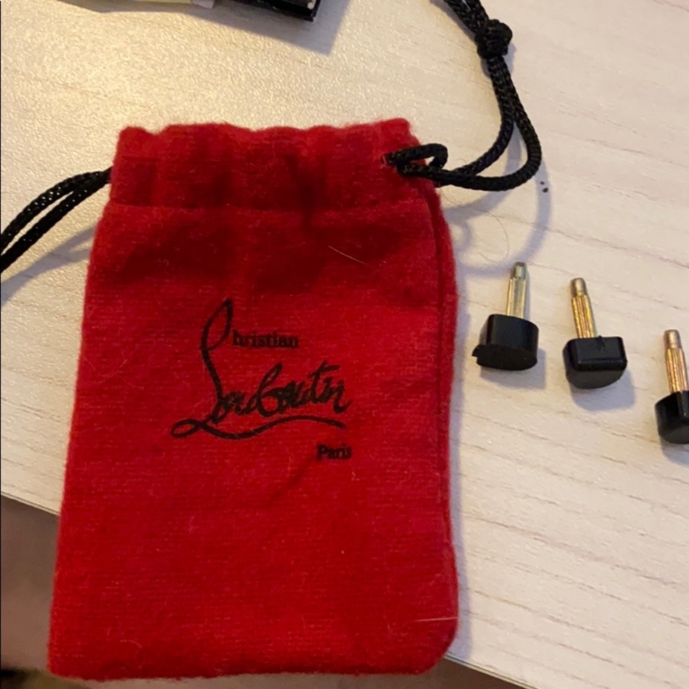 Louboutin mini dust bag with heel taps